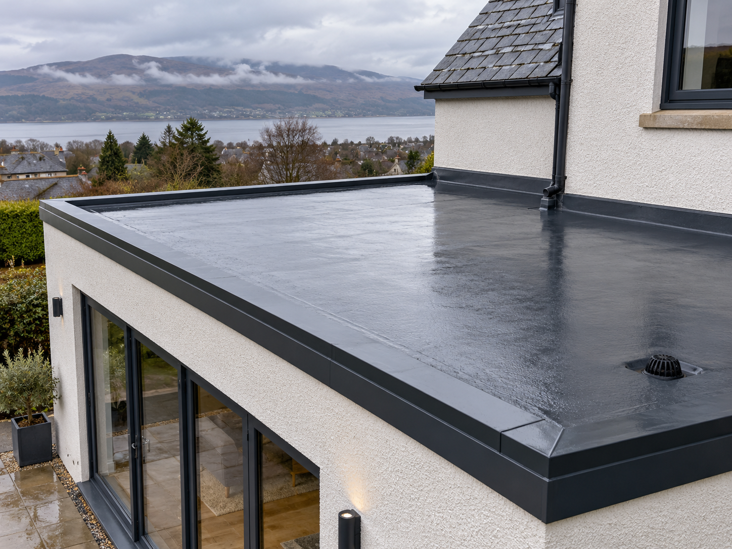Illustrative flat-roof membrane and drainage details.